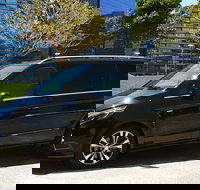 Sydney Airport Transfer in a Luxury People Mover 1-6pax TO Sydney City - South Australia Travel