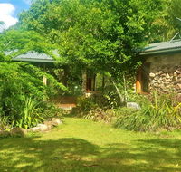Palm Grove Rainforest Retreat